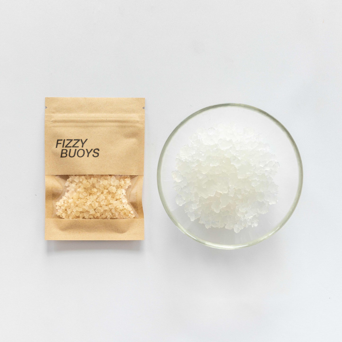 Fizzy Buoys packaging with product in a glass bowl on a white background