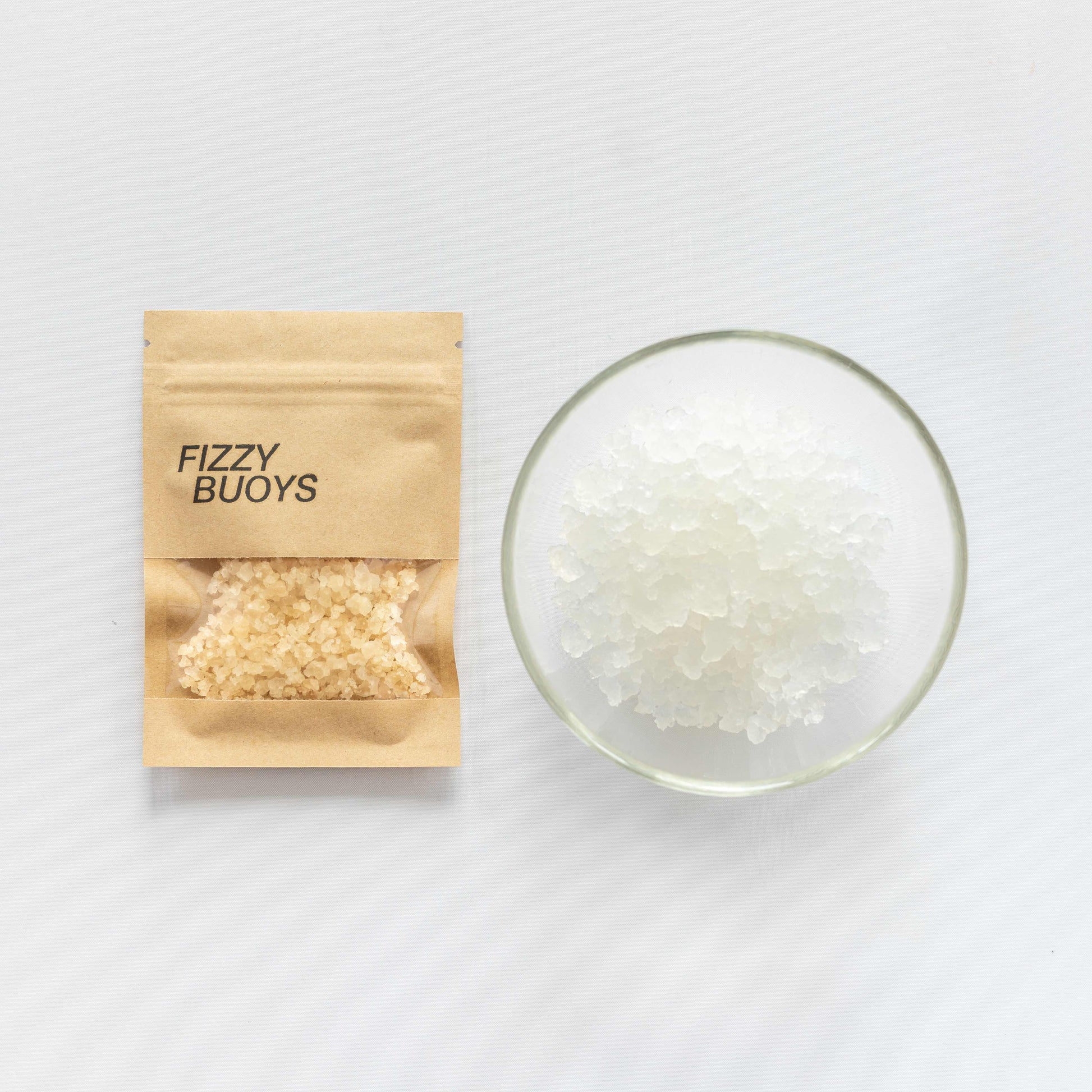 Fizzy Buoys packaging with product in a glass bowl on a white background