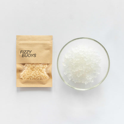Fizzy Buoys packaging with product in a glass bowl on a white background